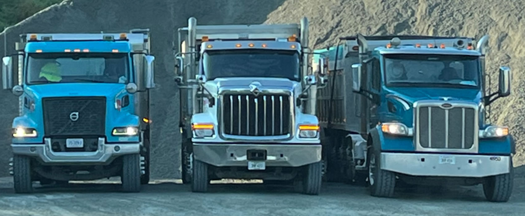 3 dump trucks