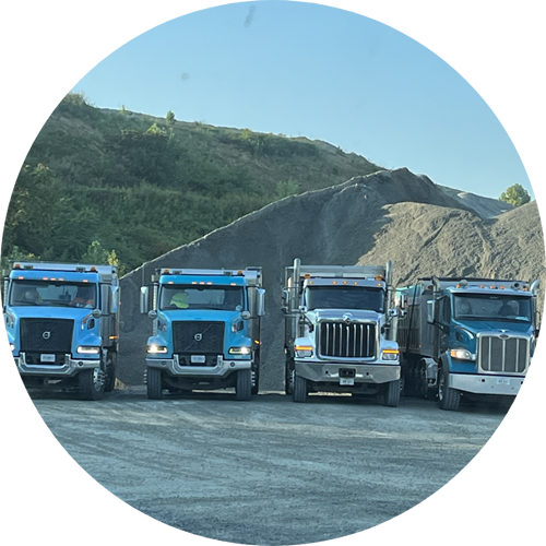 Four dump trucks